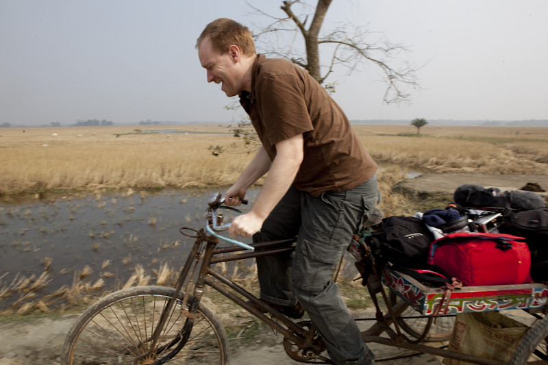 Benjamin tries to ride all of our equipment into the rice paddies! © Mike Lusmore