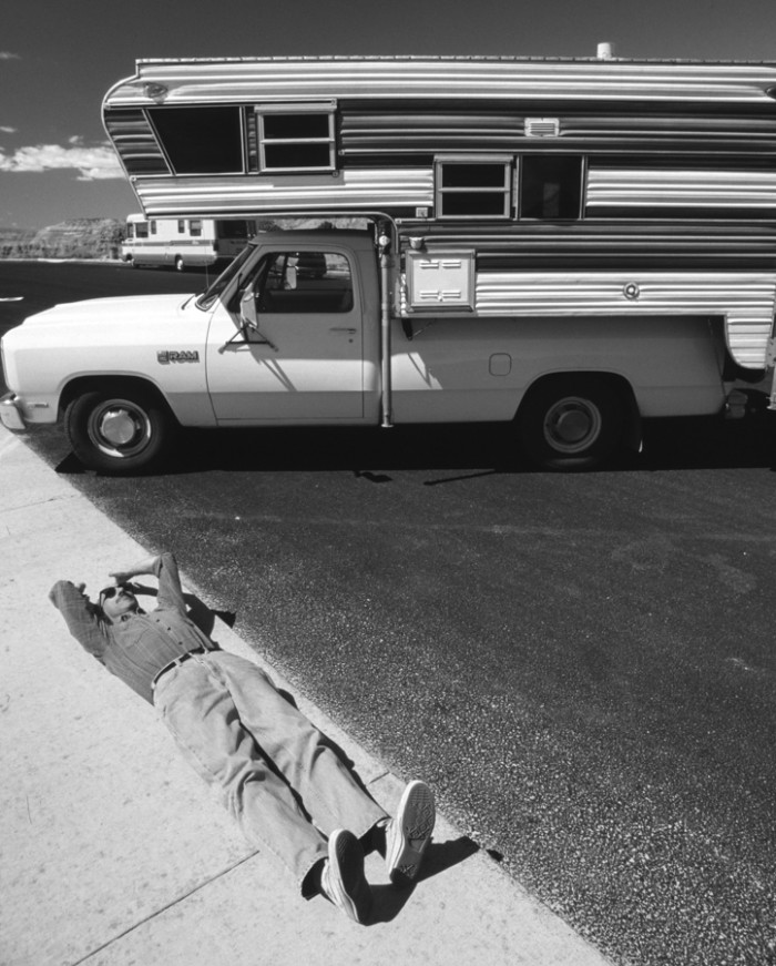 Tony catches some rays and stretches his back, Rest Area, Nevada © John MacPherson
