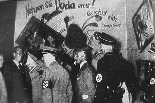 Senior Nazi officials visiting the 1937 Entartete Kunst or Degenerate Art exhibition.