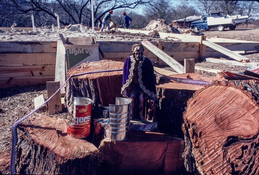 Small shrine built by the workmen laying the slab for the new house. Texas. © John MacPherson