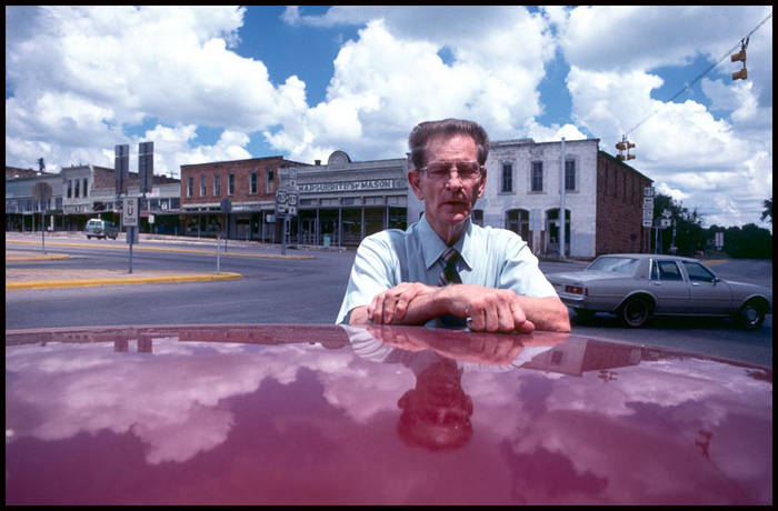 Businessman going to lunch, Mason, Texas 1980 © John MacPherson