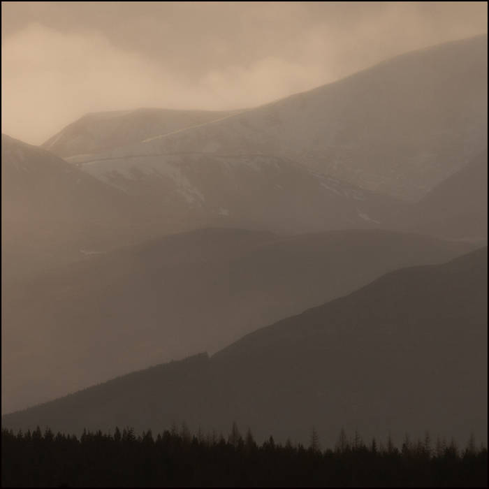 Sleet shower blurs the Monadhliath Mountains © John MacPherson